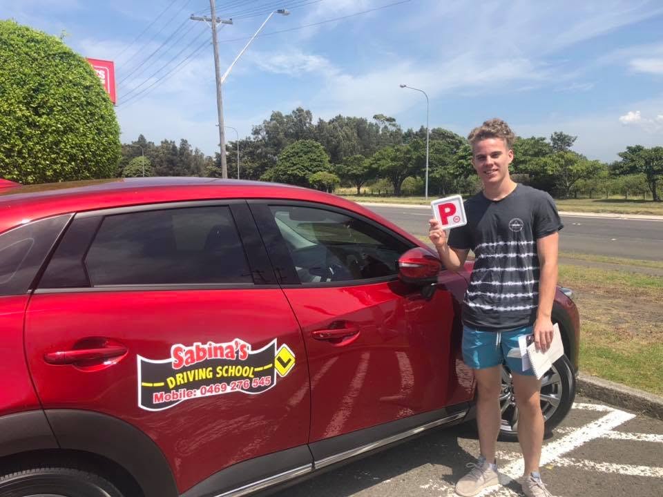 Happy student passing their P plates with Sabina's Driving School